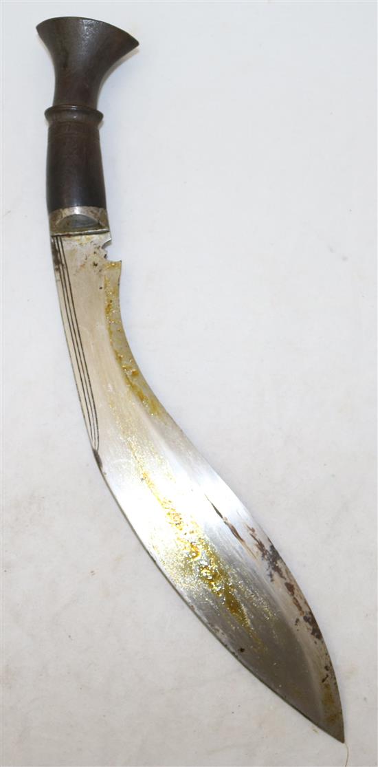 A kukri with silver mounted scabbard, overall 14in.